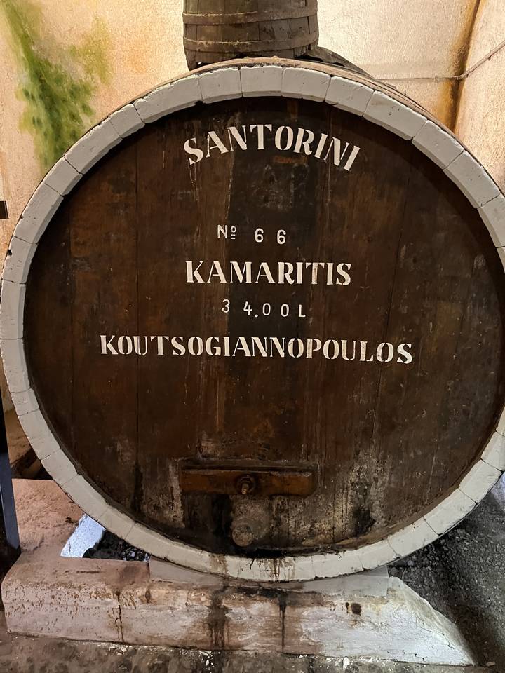 Large wine barrel with Santorini written in white.