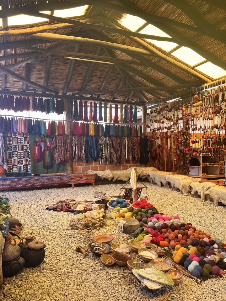Colorful textile display inside a shop.