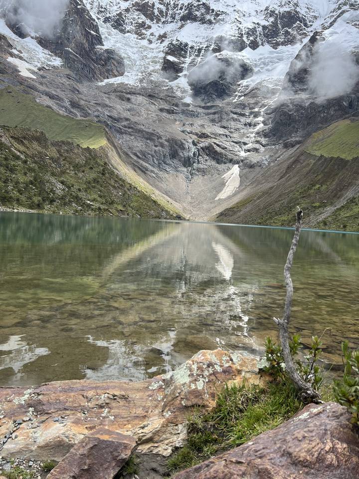 Scenic view of a mountainous landscape with a lake.