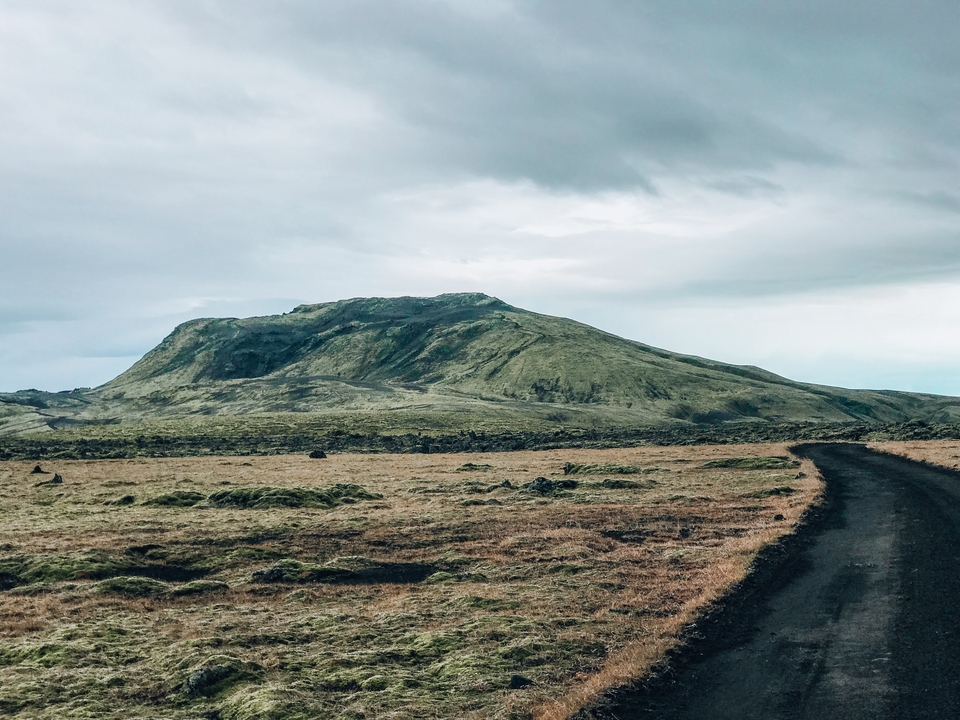 Scenic view of a mountain with a road.