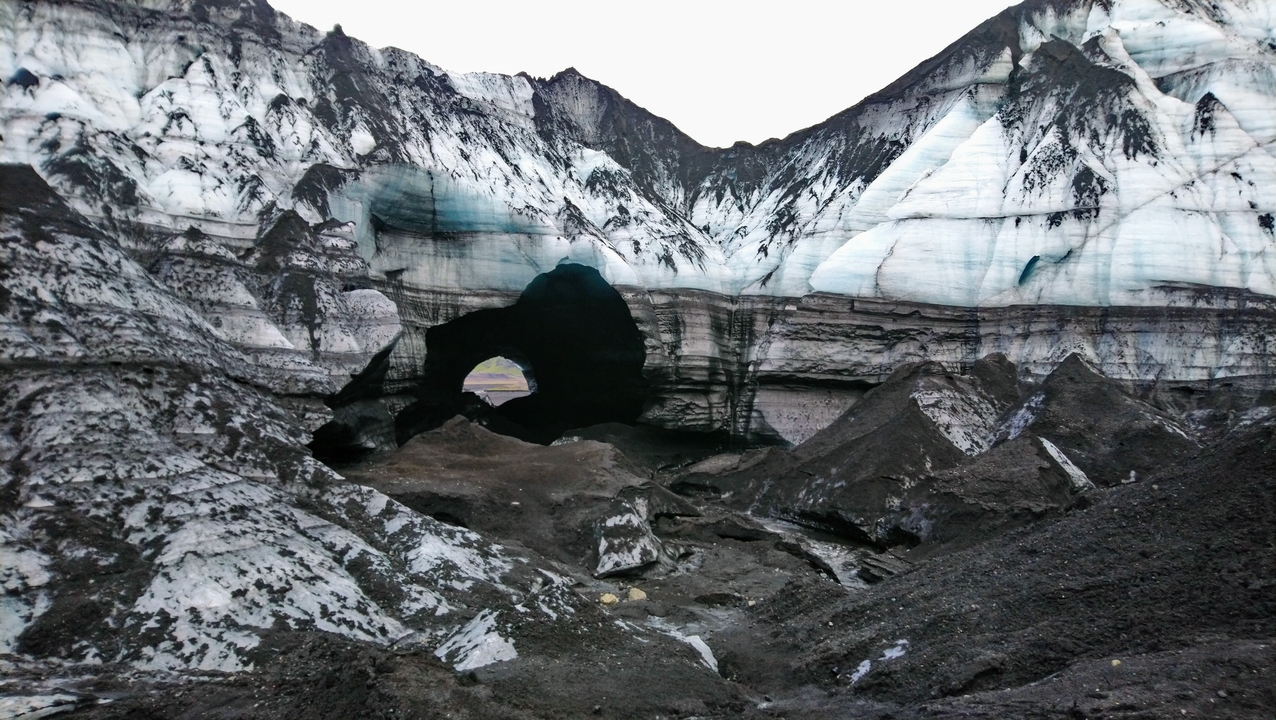 Ice cave entrance at a glacier.