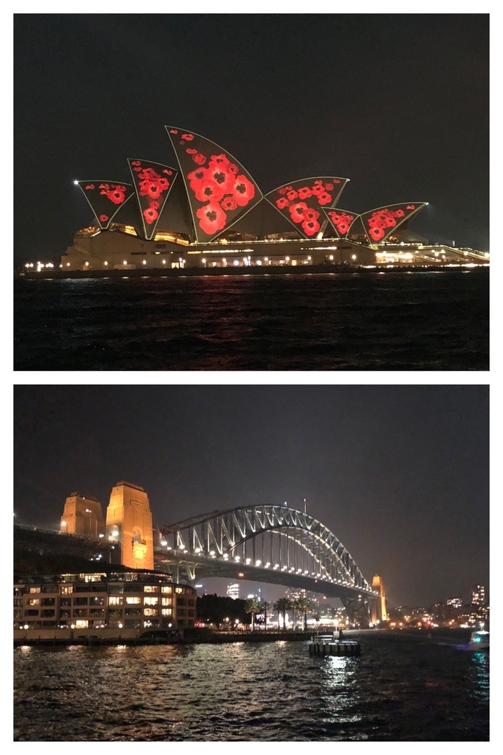 Vue nocturne de l'Opéra de Sydney et du Harbour Bridge.
