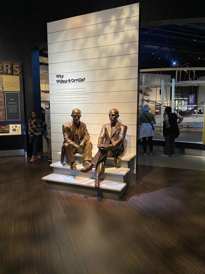 Statues of historical figures on display.