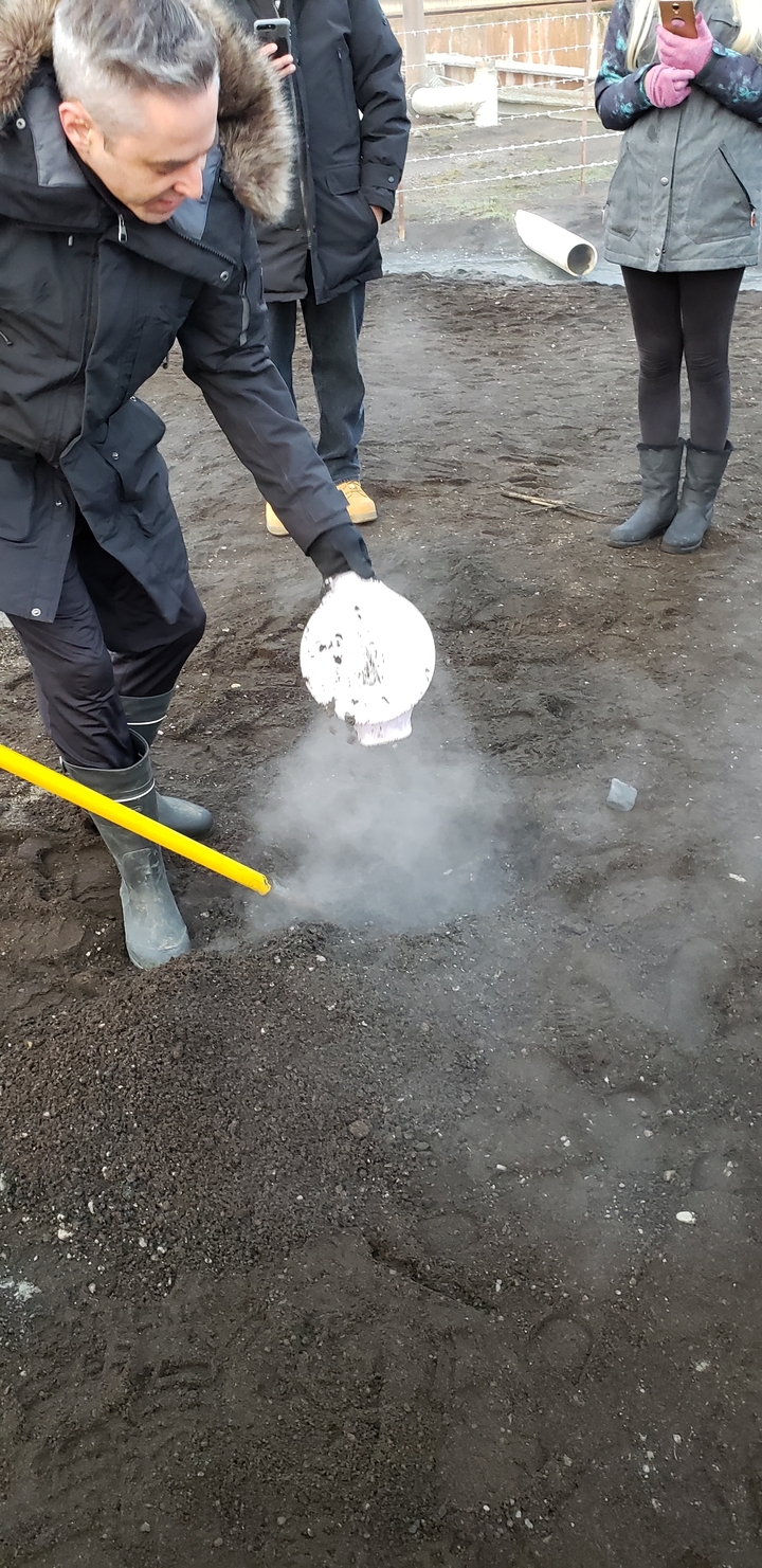 Steaming ground with a shovel inserted.