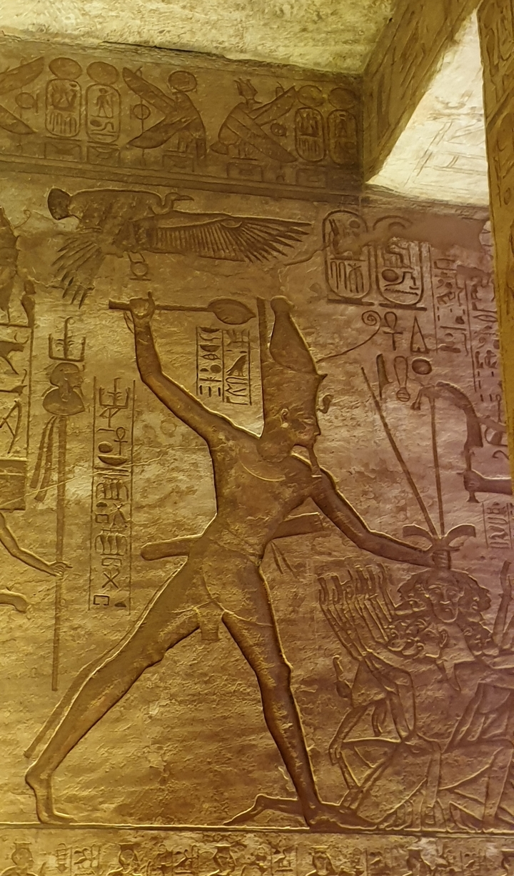 Close-up of ancient Egyptian hieroglyphics and depictions.