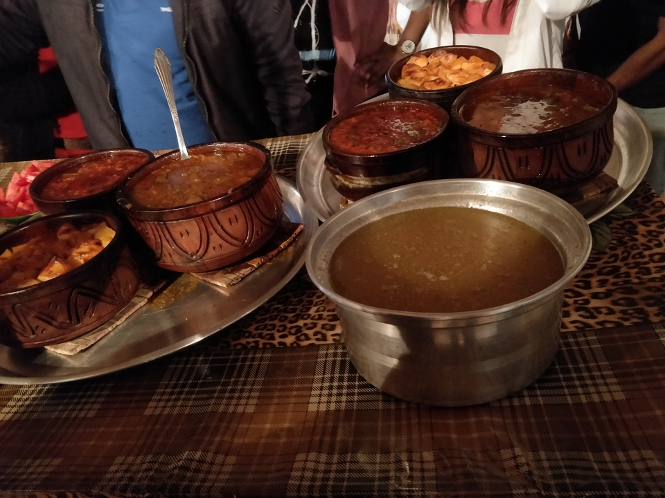 Traditional Egyptian meal with various dishes.