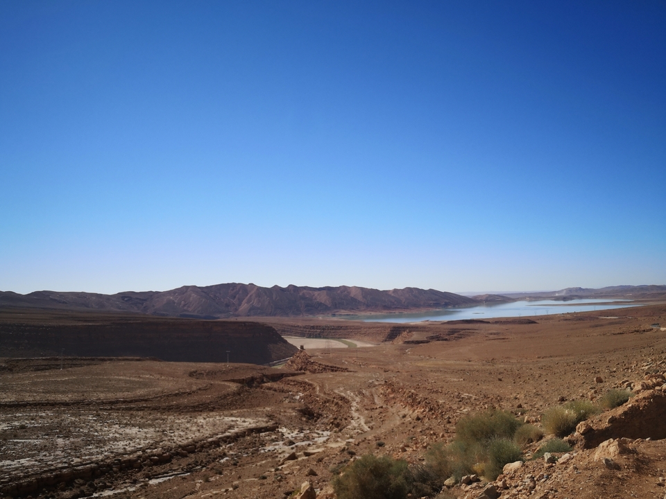 Landscape view of a lake and mountains.