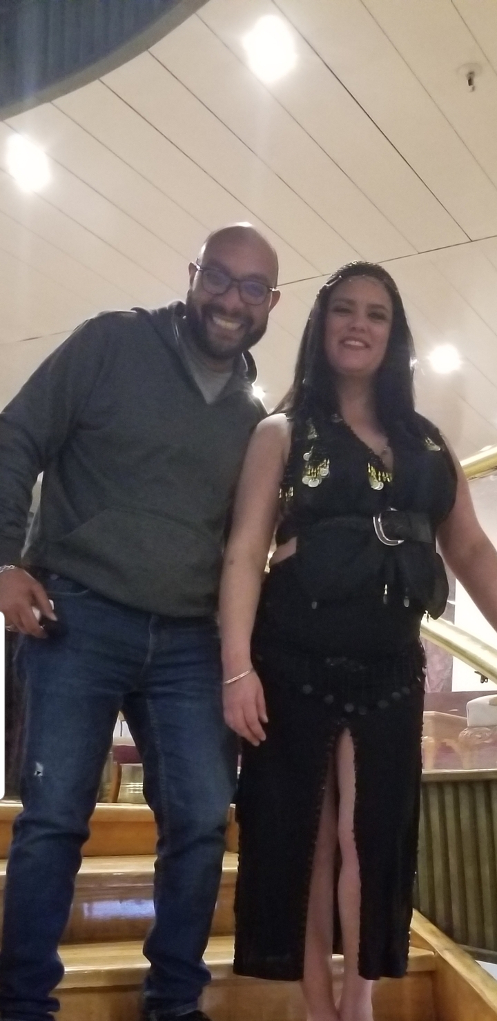 Blurry photo of two people indoors.