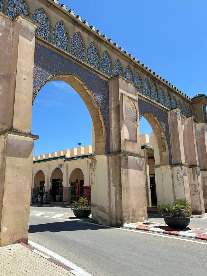 Decorative archway with blue tile patterns.