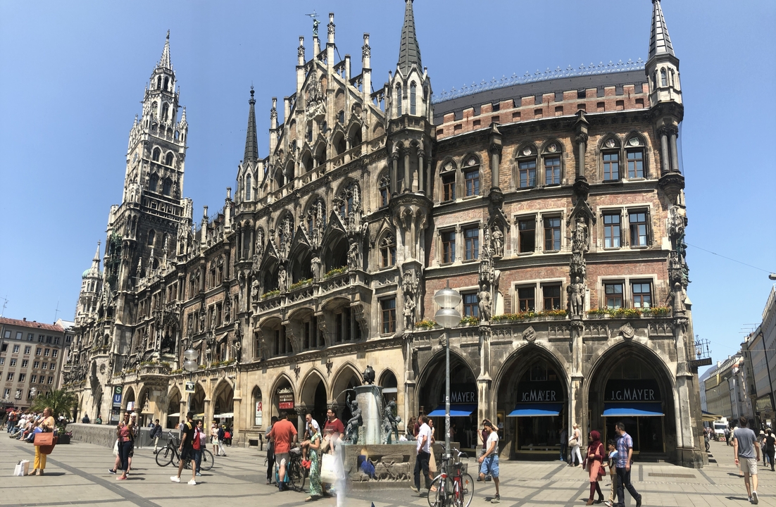 Panoramic view of a historic square with ornate architecture.