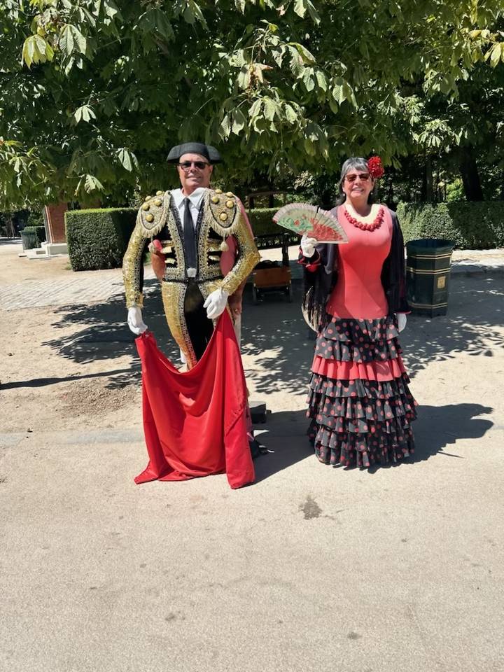 Couple dressed in traditional Spanish attire.