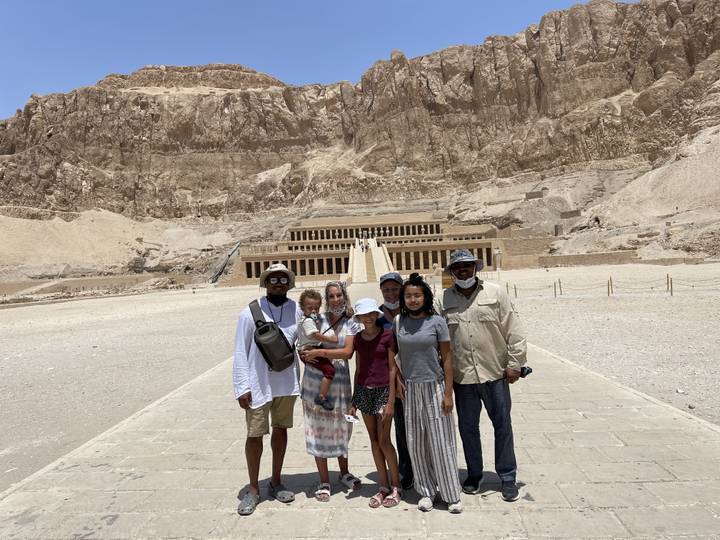 Group posing in front of the Temple of Hatshepsut.