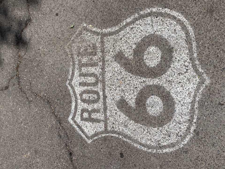 Route 66 symbol painted on the road.
