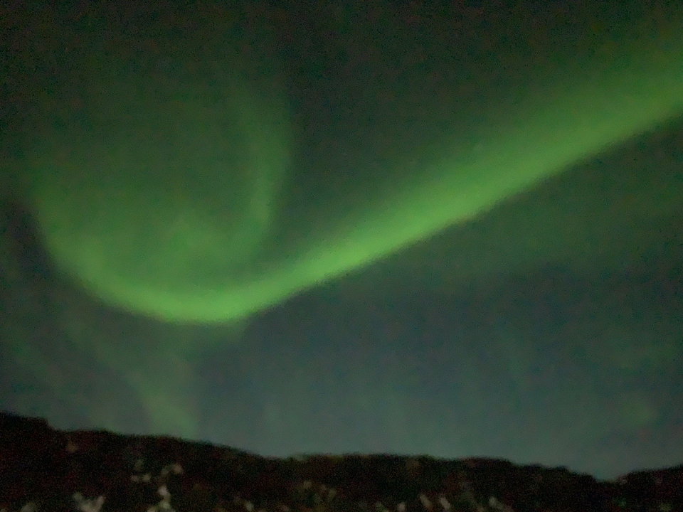 Aurora borealis in the night sky.