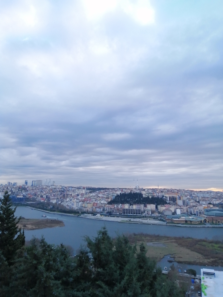 City skyline under a cloudy sky