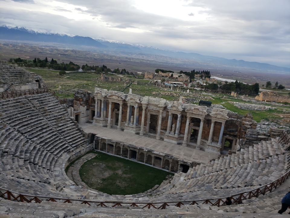 Theater ruins with panoramic view of Pamukkale, Turkey.