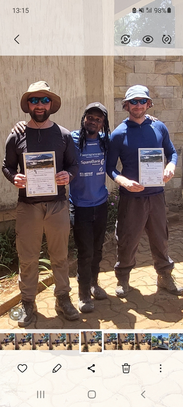 Group photo of people holding certificates.