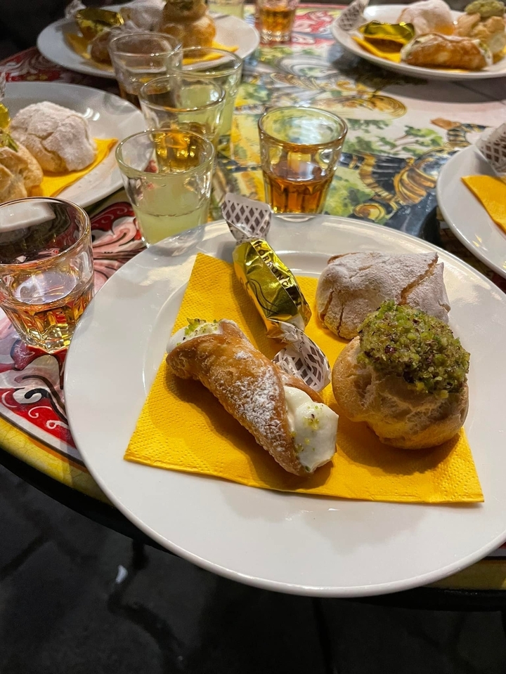 Plate with cannoli and other pastries.