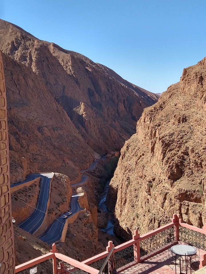 A gorge with steep rocky cliffs.