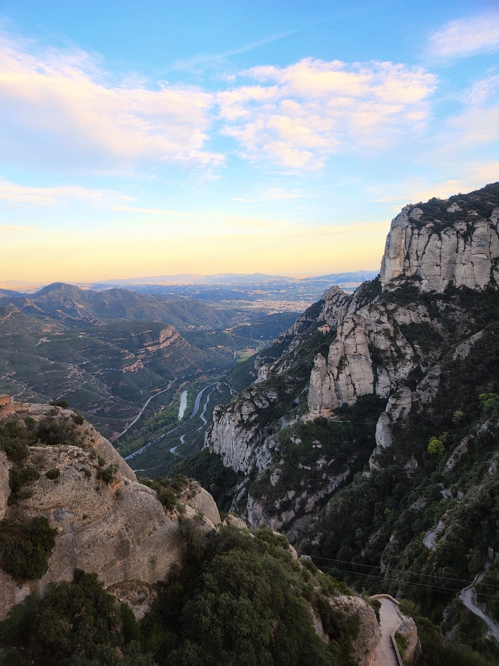 Mountainous landscape at sunset.