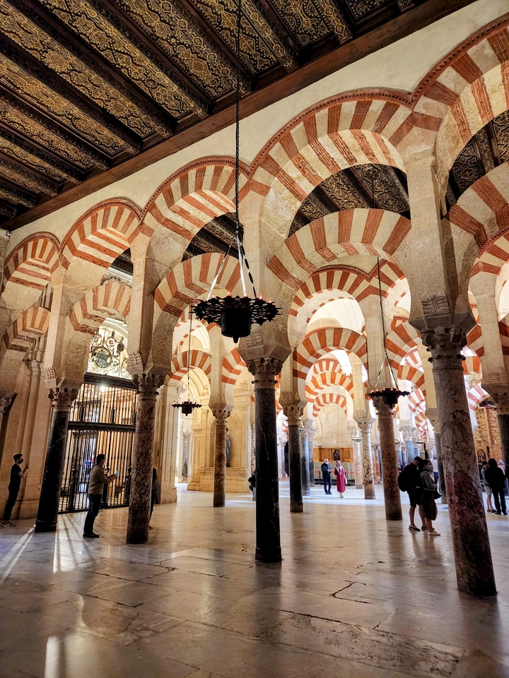 Ornate arches inside a historic building.