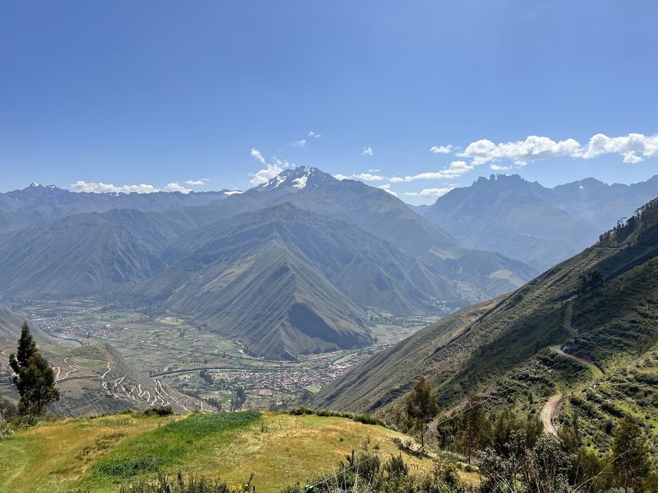 Expansive view of the Andes Mountains with villages below.