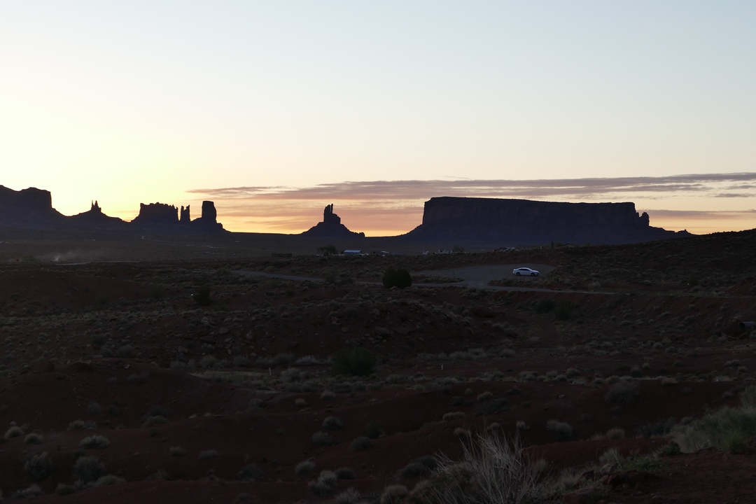 Silhouette of Monument Valley at sunset.