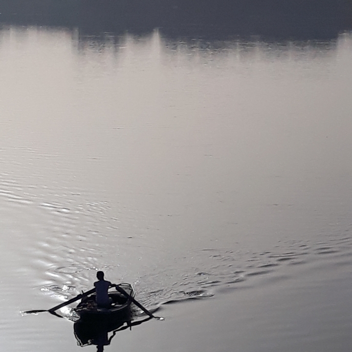 A body of water with a rippled surface.
