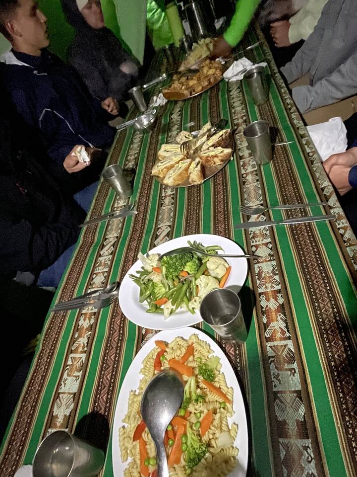 Table with plated food set for a meal.