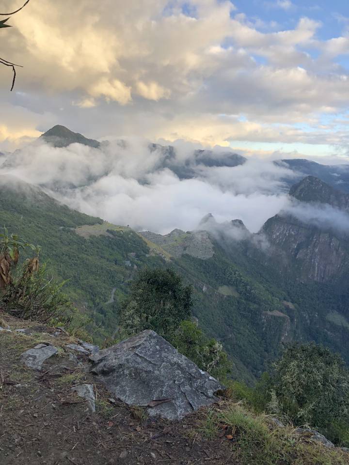 Clouds and landscape surrounding Machu Picchu.