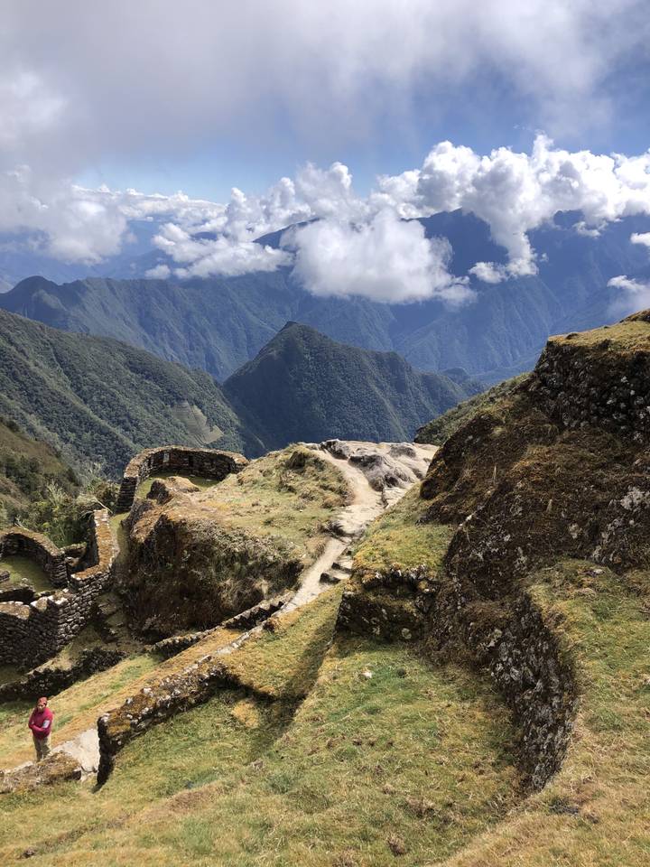 Winding mountain path with expansive valley views.