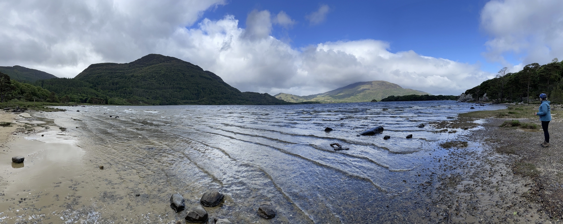 Scenic view of a lake with mountains in the background.