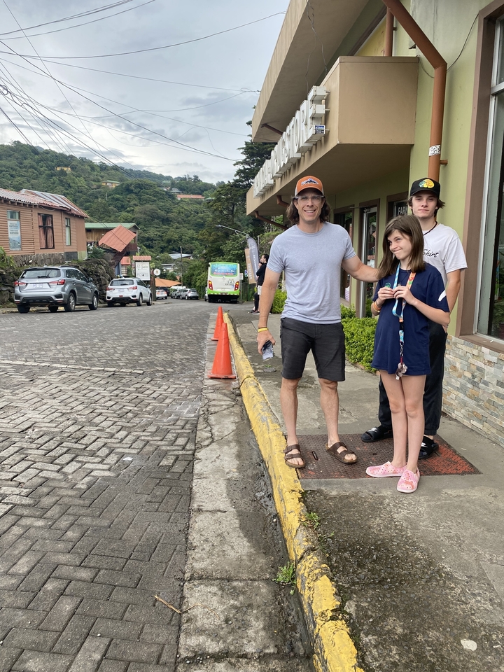 People posing on a street
