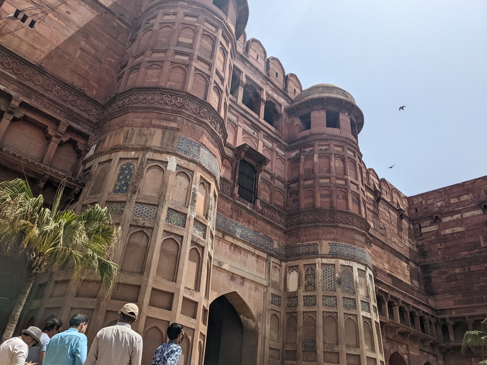 Facade of an ancient fort with detailed architecture.