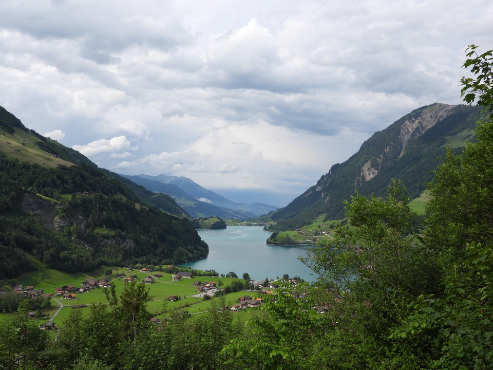 Scenic mountain landscape with a lake in the valley.