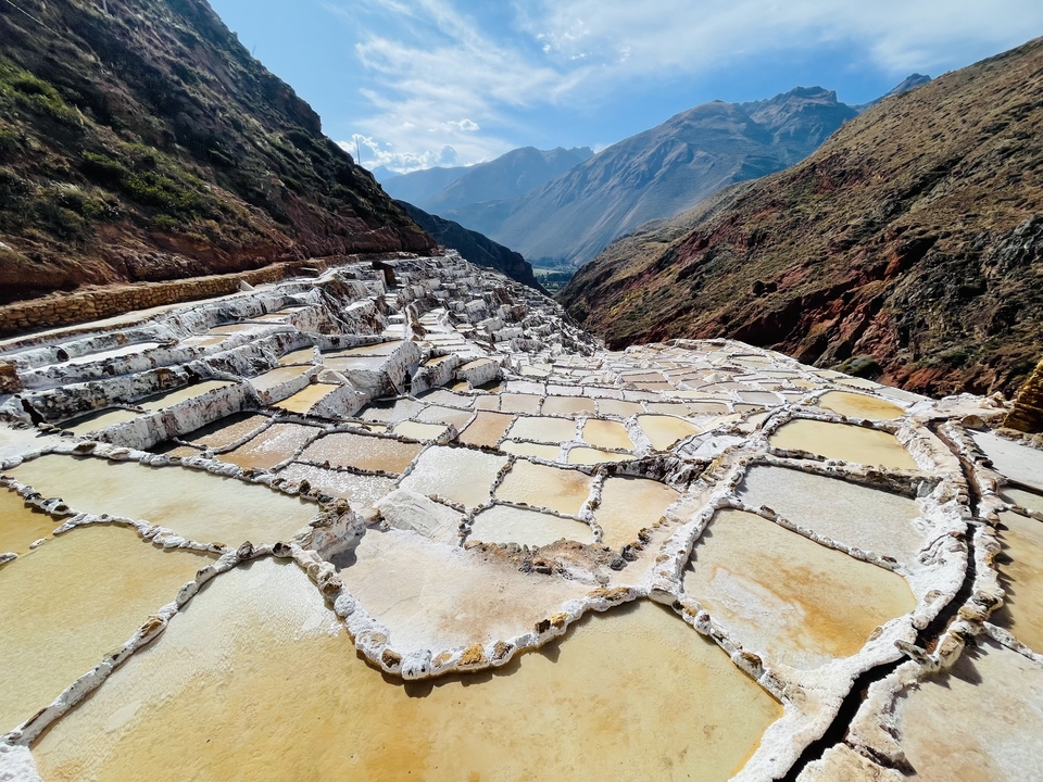Salt terraces in a mountainous landscape.
