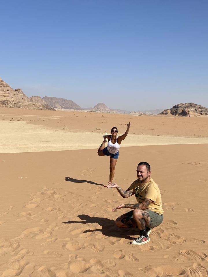 Woman striking a pose in the desert.
