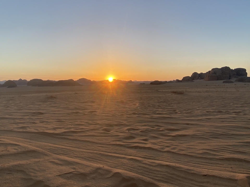 Desert landscape with sunset.