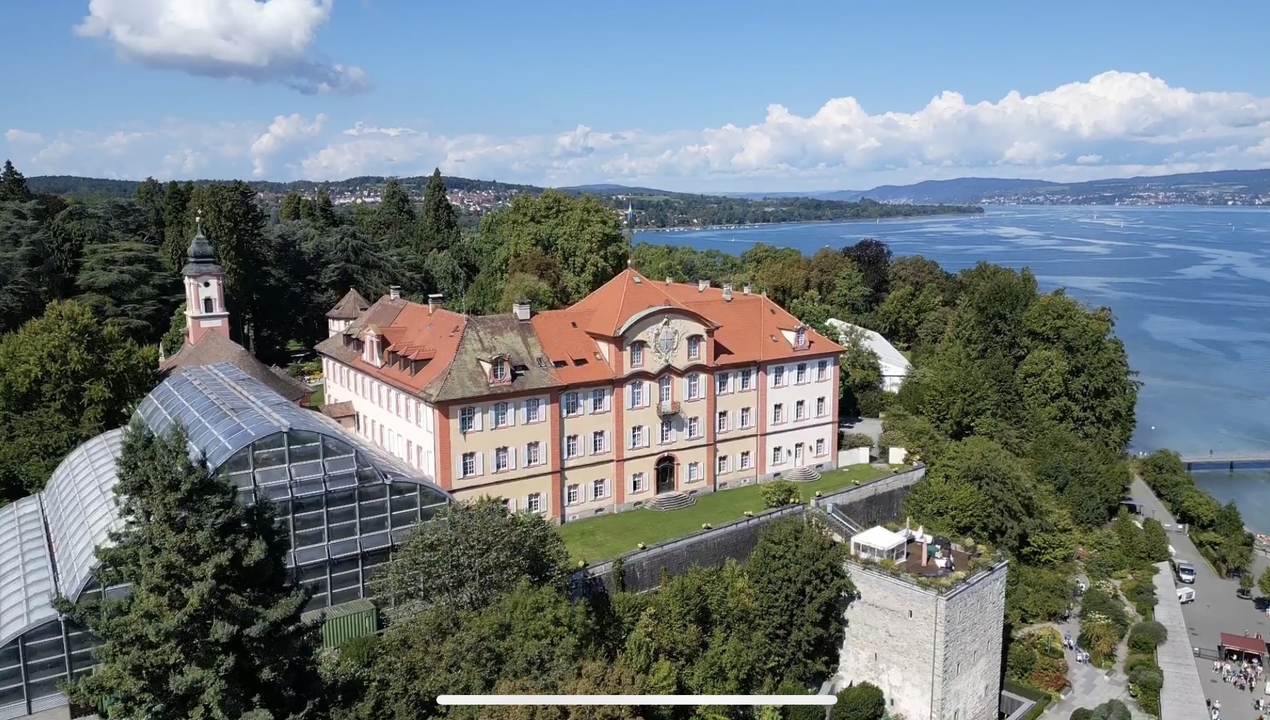 Baroque-style estate on a lakeside estate with gardens.