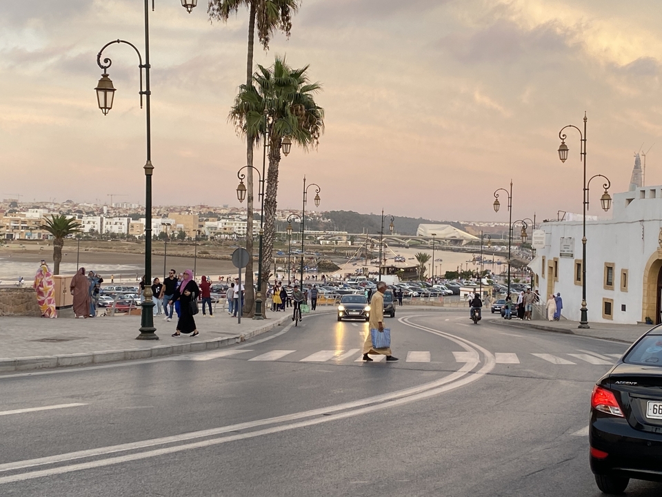 Scenic view of a bustling street near the coast.