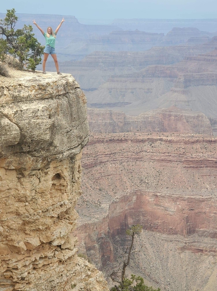 Rocky cliff formations in a canyon.