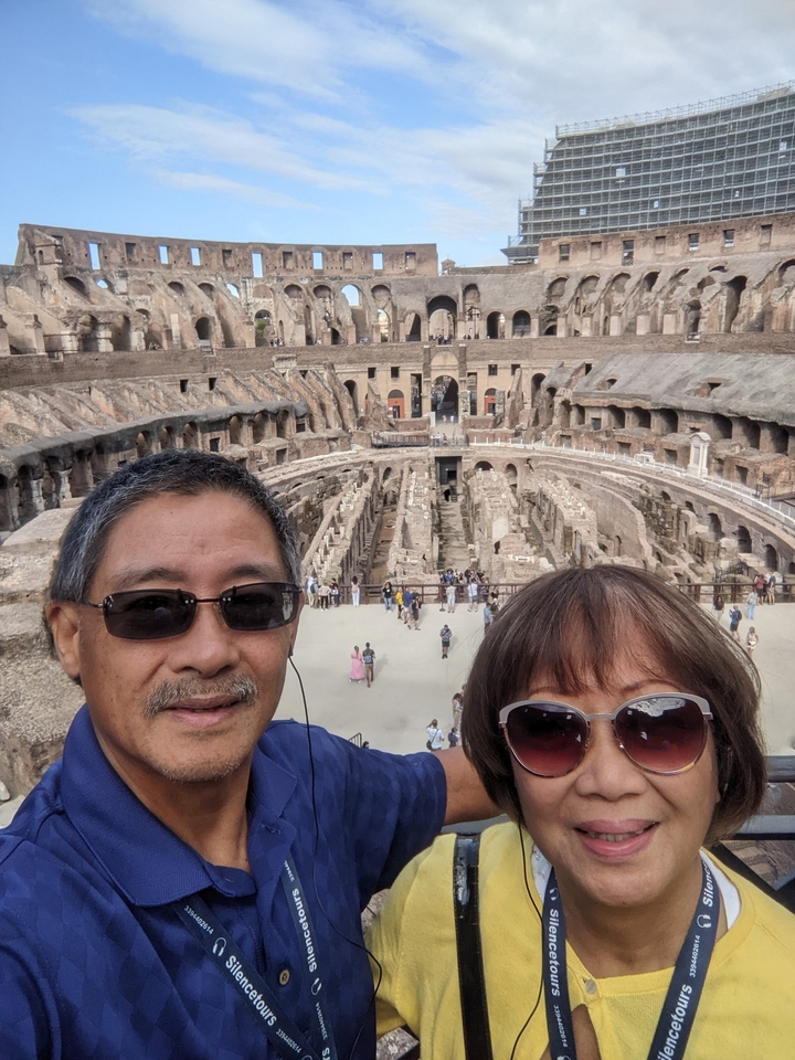 Tourists inside the Colosseum in Rome.