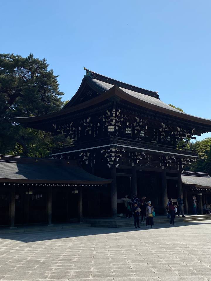 Traditional Japanese temple with ornate wooden roof.