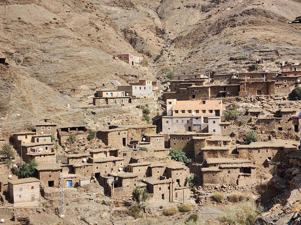 Stone village nestled in a rocky hillside.