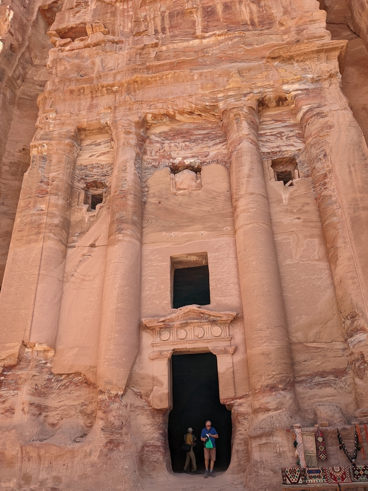Facade of an ancient building with a carved architectural style