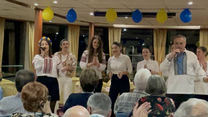 Performance with a group of people singing