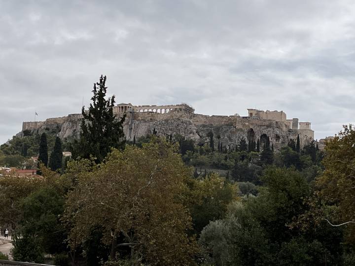 View of the Acropolis surrounded by greenery.