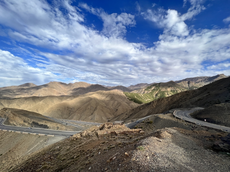 Mountainous landscape with winding roads.