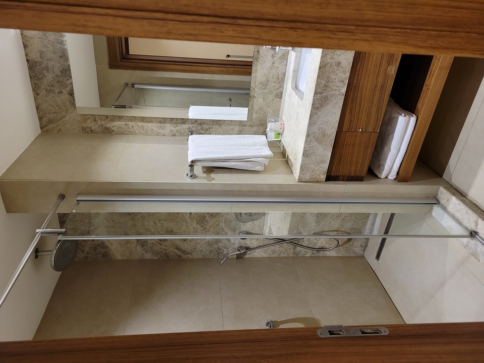 Bathroom with shower and clean decor.