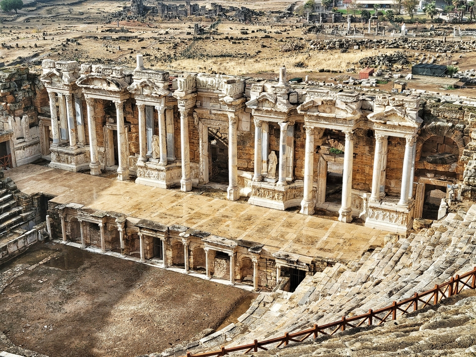 Ancient Roman theater with well-preserved stone structure.